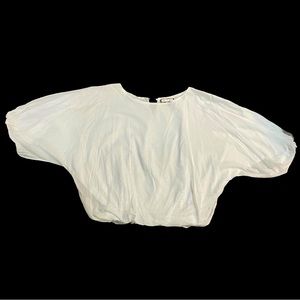 100% White Cotton blouse with elastic band at the waist. Used only once!